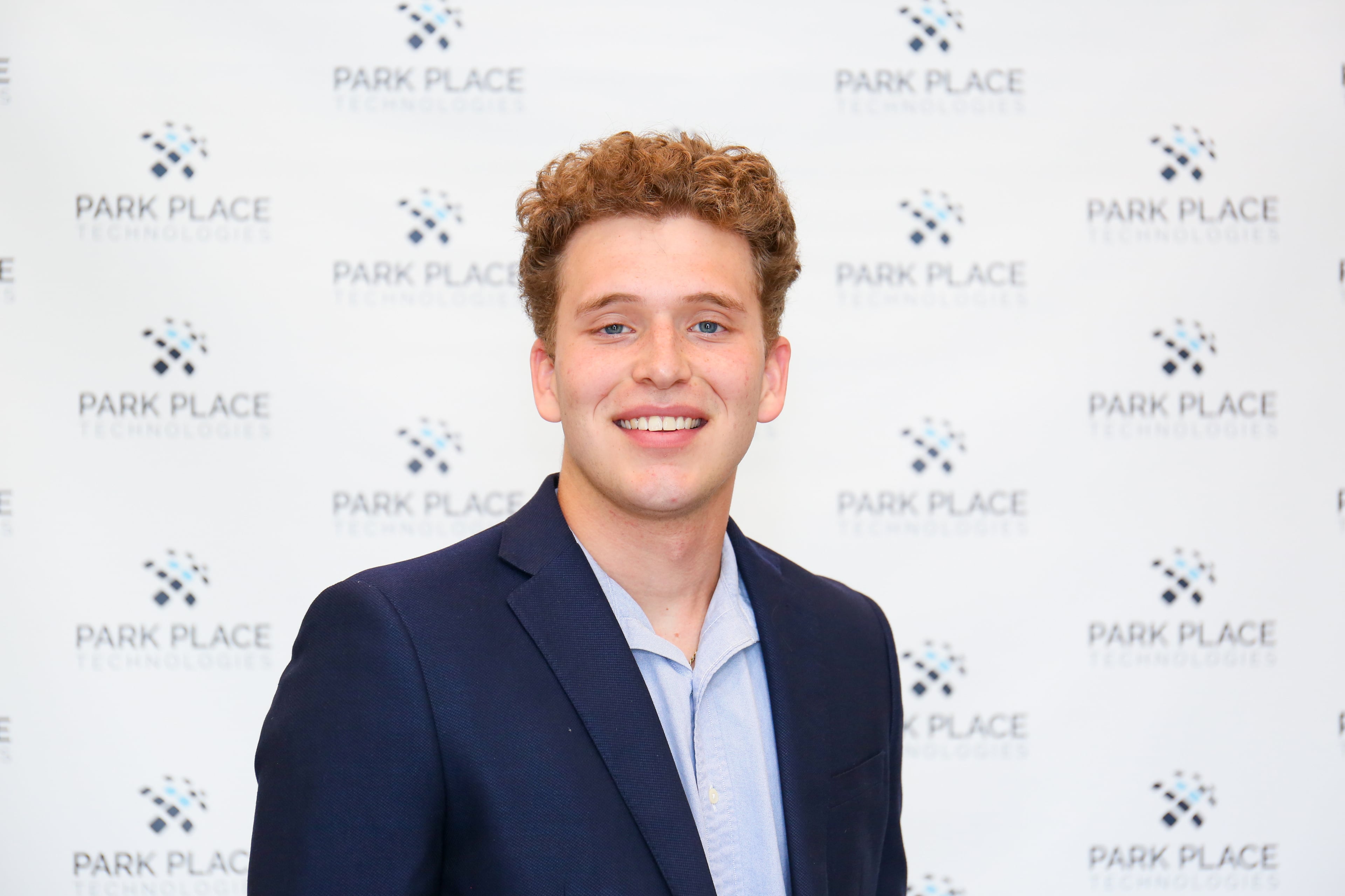 Grant Conner smiling outdoors in Tampa